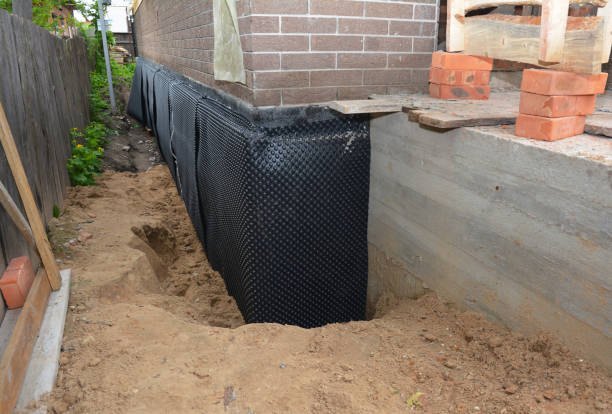 Happy homeowners after waterproofing job in Englewood